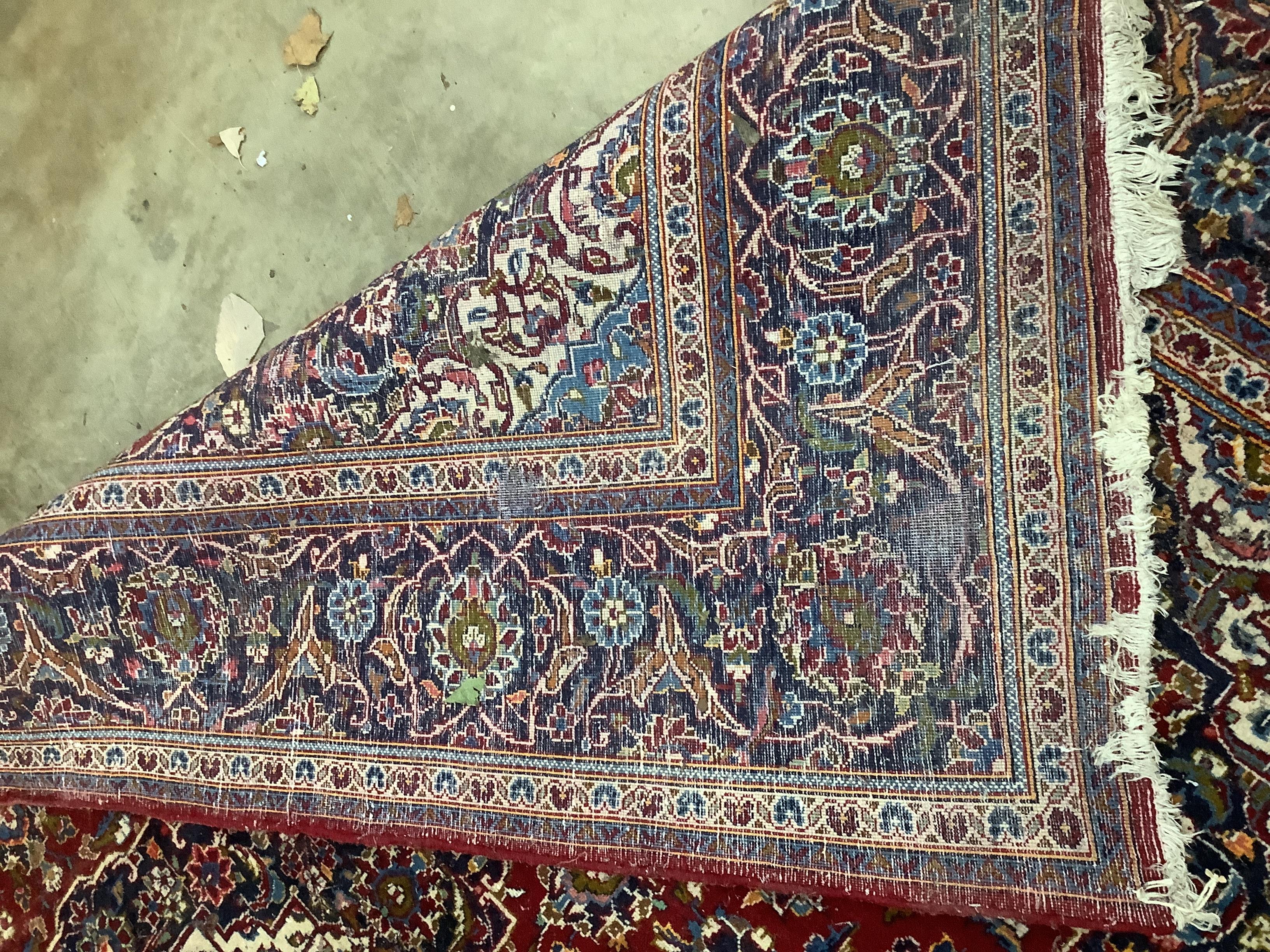 A North West Persian red ground carpet, 300 x 200cm